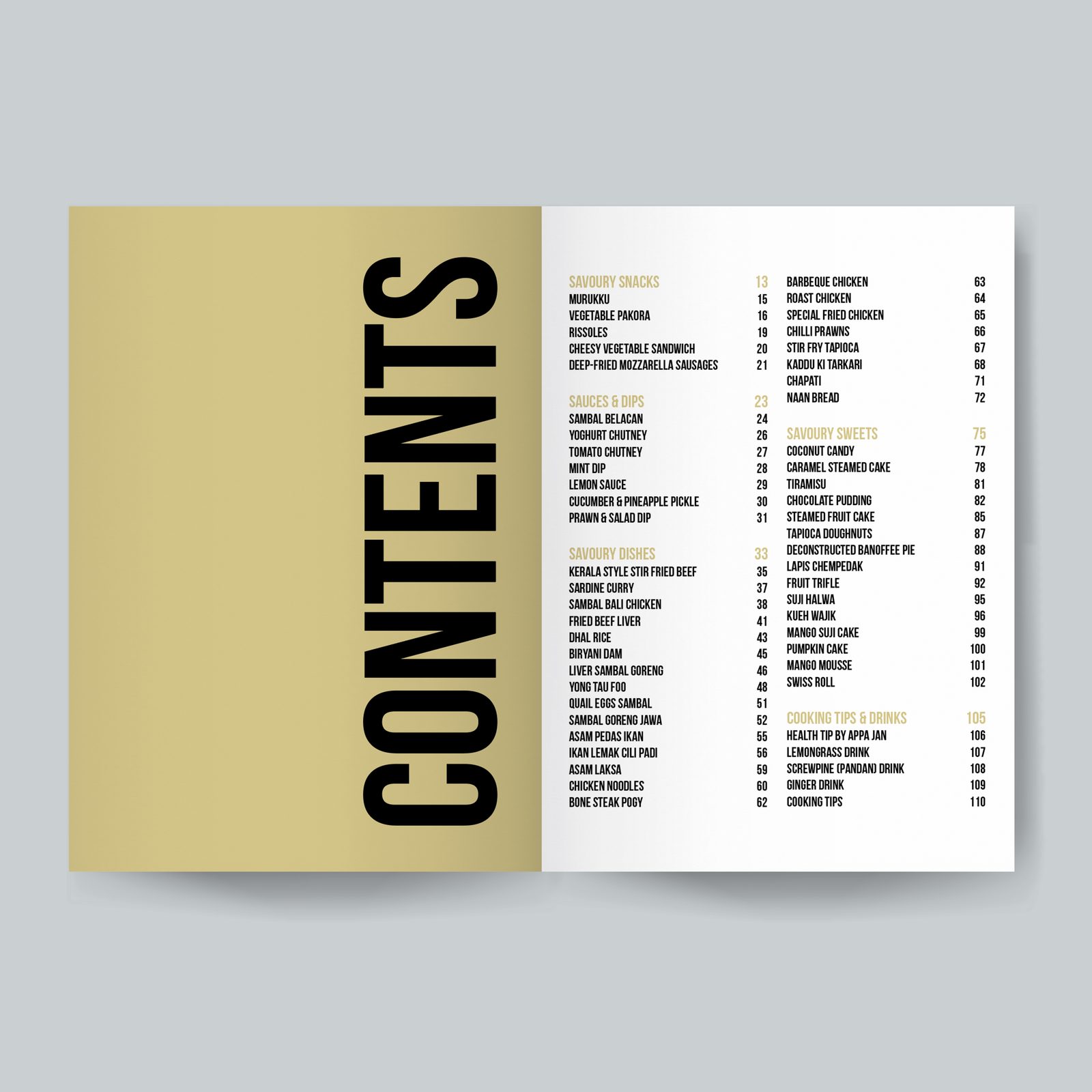 Printed cookbook opened flat, showing a recipe spread with a full-page food photograph facing structured text