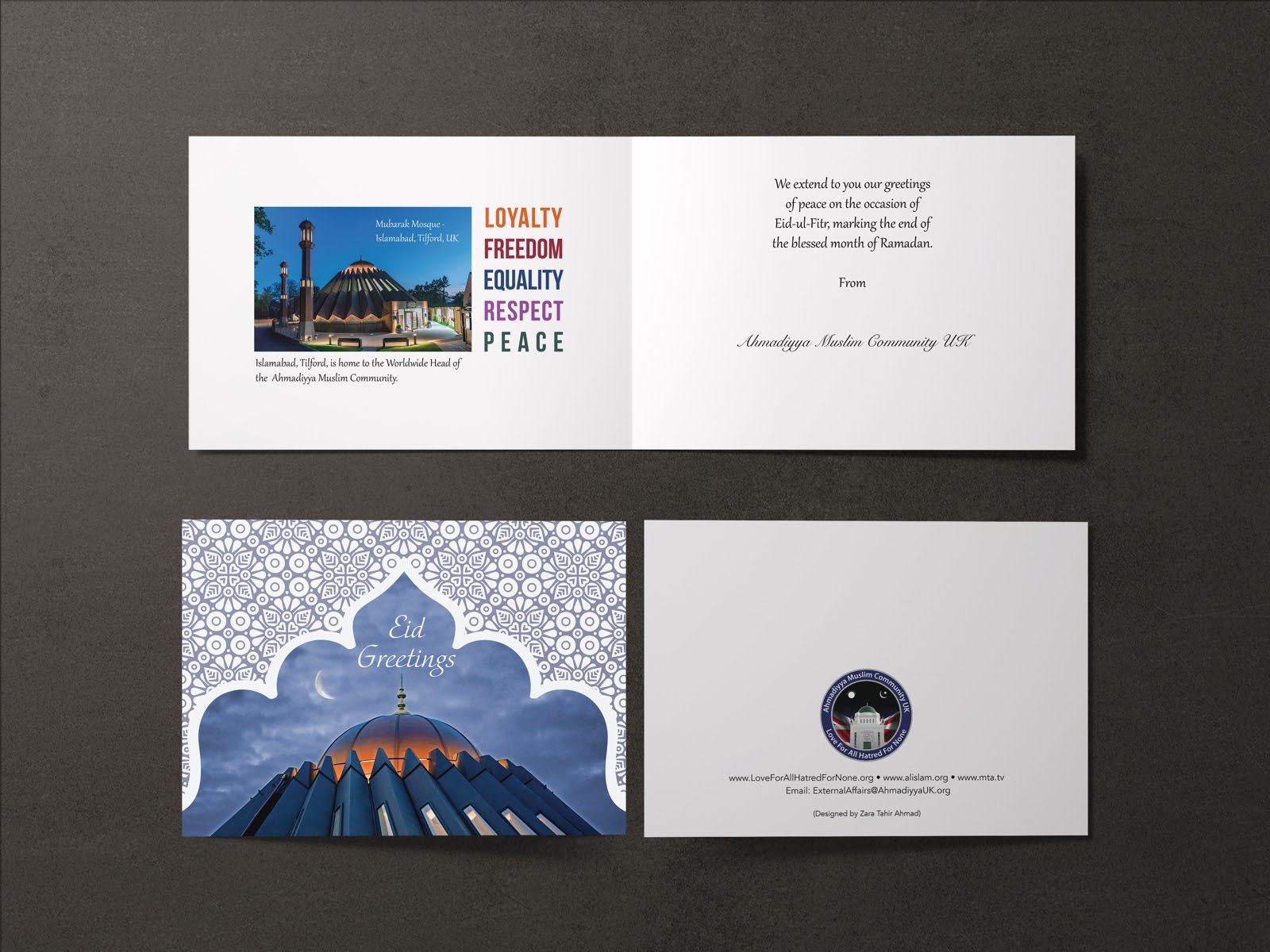 Eid Greetings card shown open and from the back: the Mubarak Mosque at dusk seen through a cut-out arch in a pale geometric lattice
