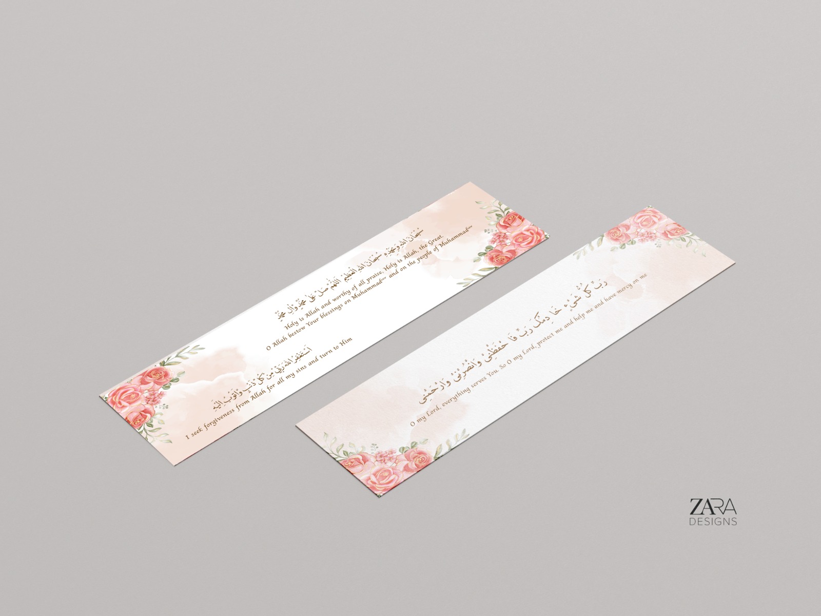Two blush pink floral bookmarks printed with short Arabic dhikr and English translations